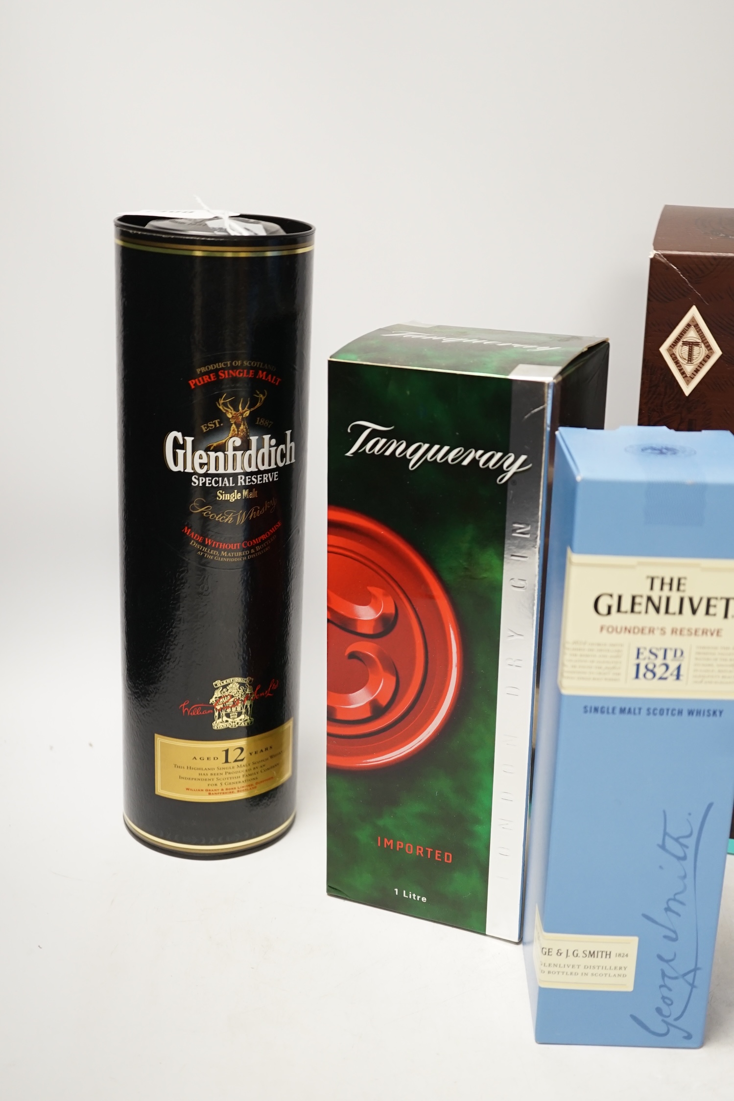 Five bottles of spirits including Glenfiddich single malt whisky and Tanqueray